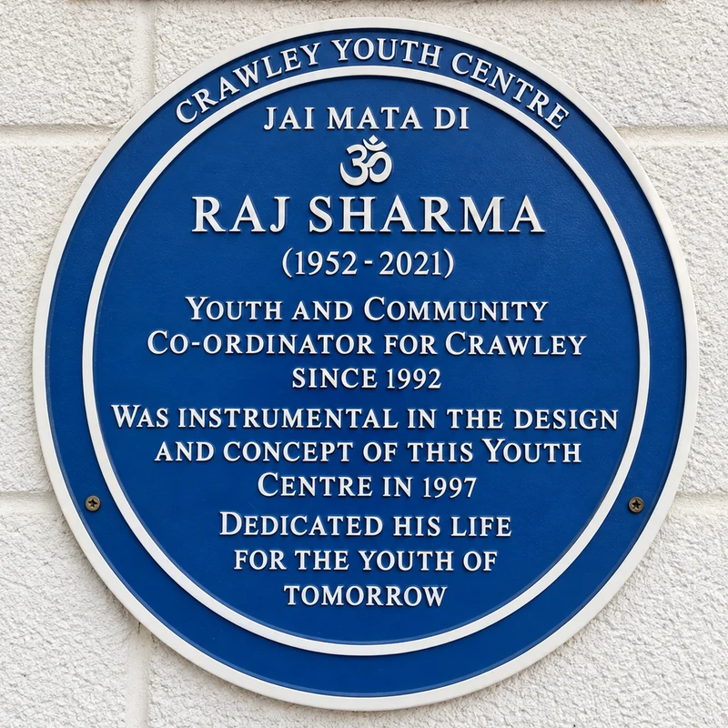 Blue memorial plaque for Raj Sharma, 1952–2021, at Crawley Youth Centre
